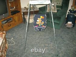 Vintage windup manual hand crank baby seat swing. Removable toys. Works