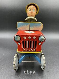 Vtg 1944 GI Joe Jouncing Jeep Wind Up Tin toy WW2 Litho Unique Art USA