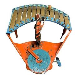 WOLVERINE No. 48 ZILOTONE Tin Wind Up Circus Clown Playing Xylophone Vintage