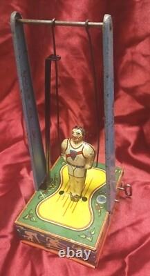 Wyandotte Tin Wind Up Toy Man On The Flying Trapeze Sport Athletic WORKING 1941