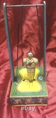 Wyandotte Tin Wind Up Toy Man On The Flying Trapeze Sport Athletic WORKING 1941