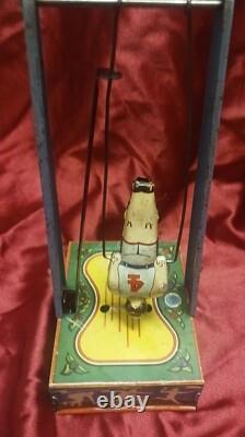 Wyandotte Tin Wind Up Toy Man On The Flying Trapeze Sport Athletic WORKING 1941