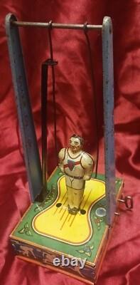 Wyandotte Tin Wind Up Toy Man On The Flying Trapeze Sport Athletic WORKING 1941